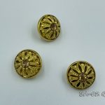 gold button with gold crystal