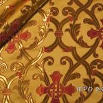 115 = Light gold base with lyre gold, tile and red pattern