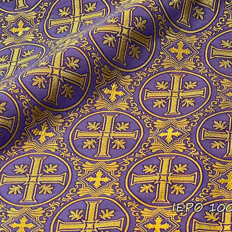 Ткань на светло-фиолетовой основе с золотыми крестами в кругах.
