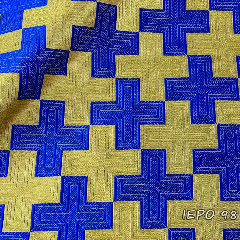 Ύφασμα με σχέδιο συνεχόμενους τετράγωνους σταυρούς, εναλλαγή χρωμάτων των σταυρών ανά έναν σε χρυσό και μπλε.